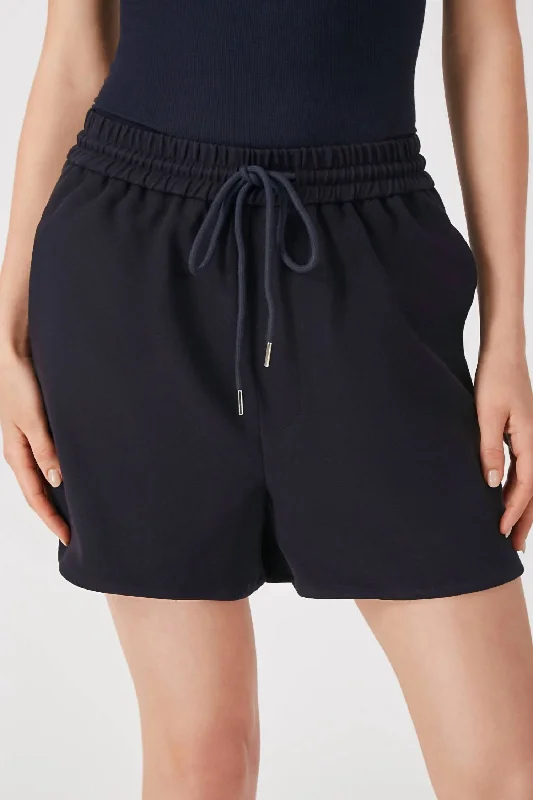Versatile outfits to transition from day to night   The Mathewson Jog String Shorts In Dark Navy