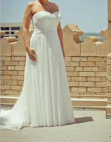 Effortlessly chic fashion for today’s woman   David's Bridal Galina Swiss Dot Tulle Empire Waist Soft Wedding G
